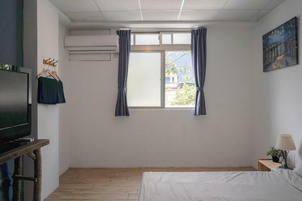 Dulan The Travel Bug Bistro Inn Donghe Exterior foto